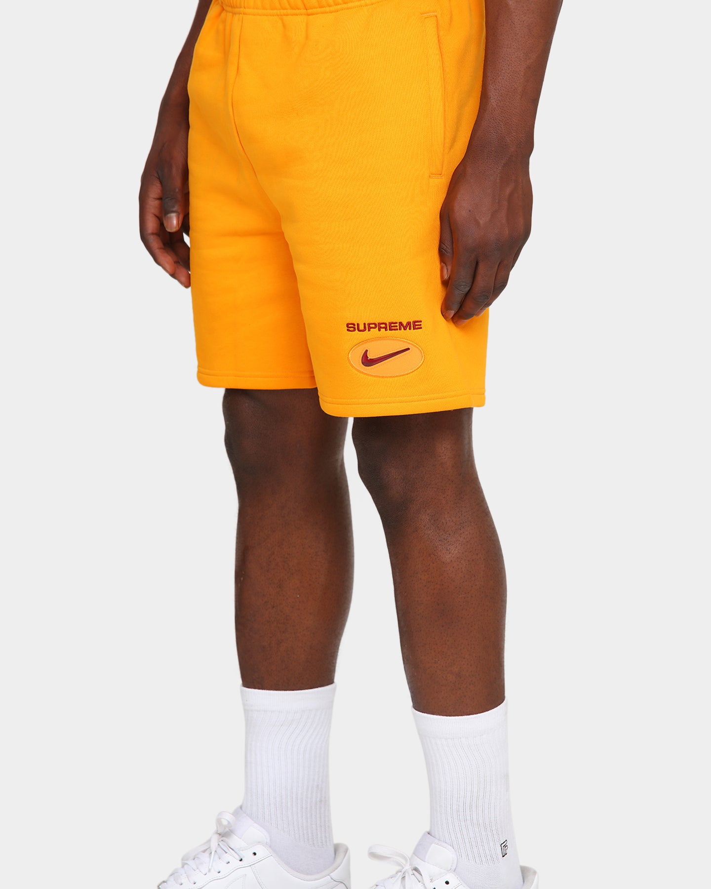 orange supreme shorts