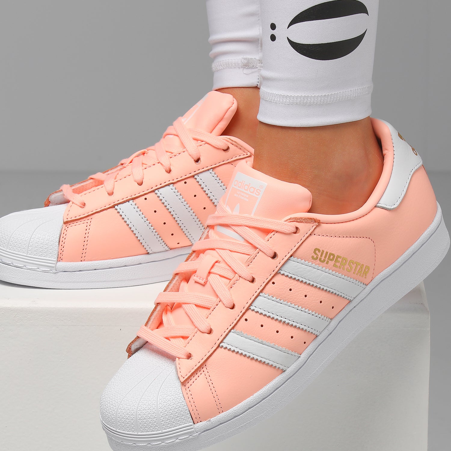 adidas superstar womens pink and white