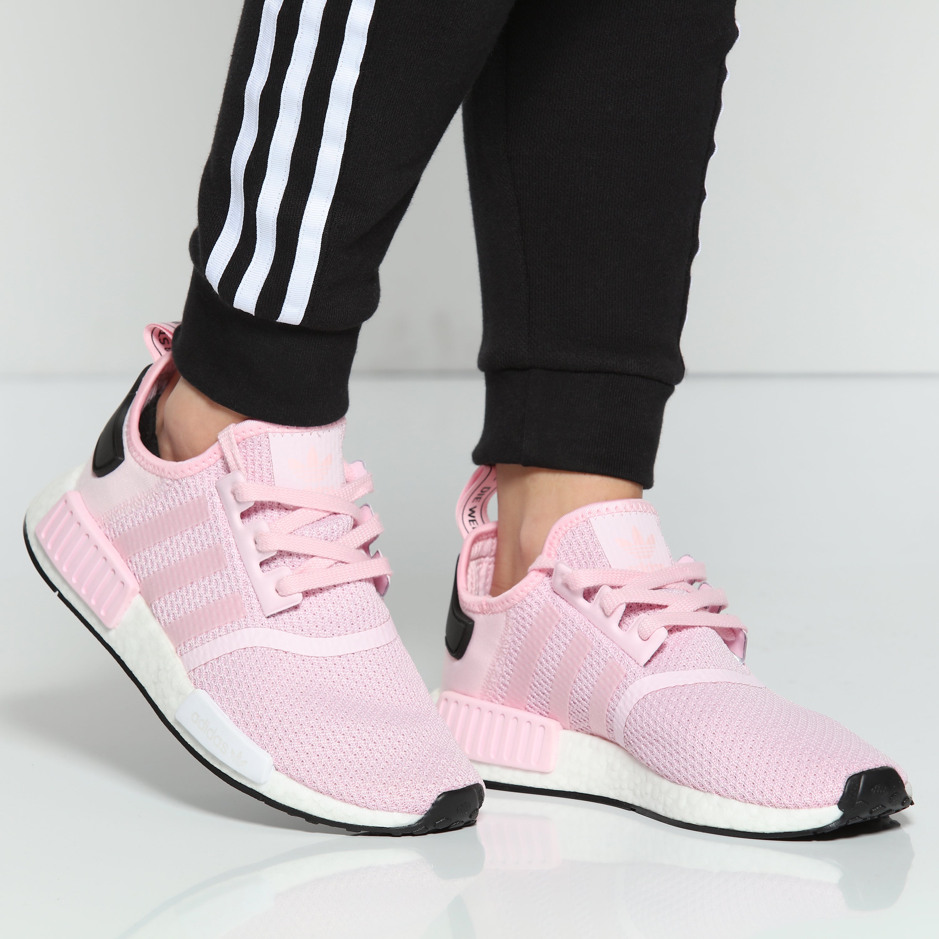 pink white and black adidas