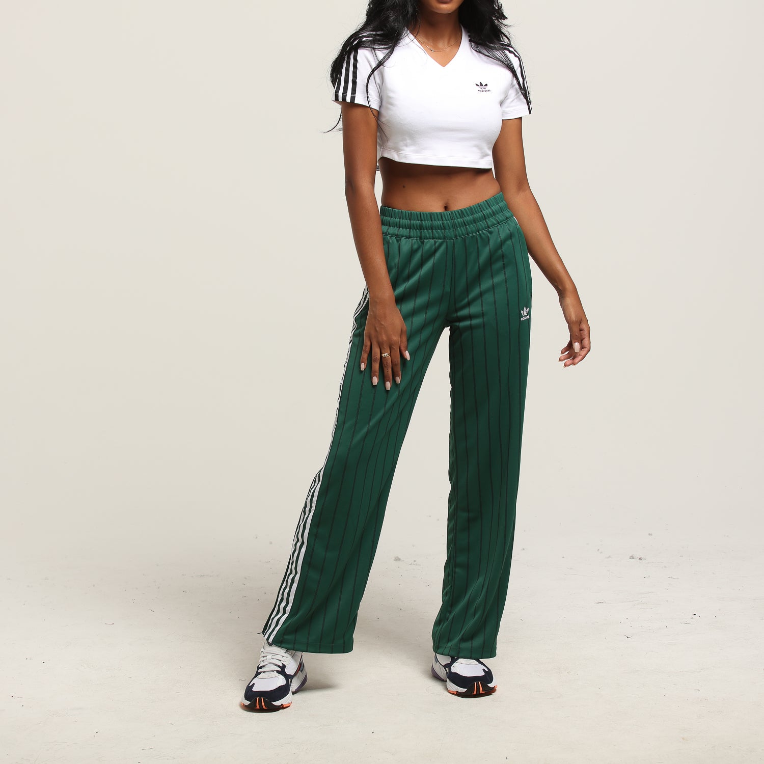 dark green adidas track pants