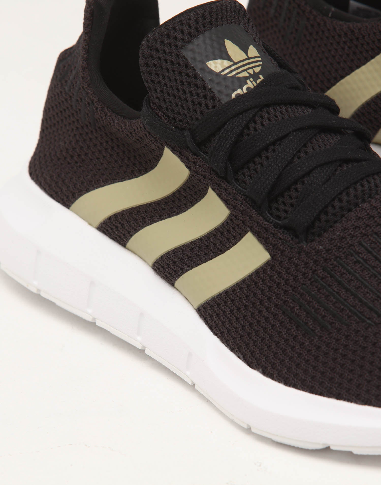 black and gold adidas swift