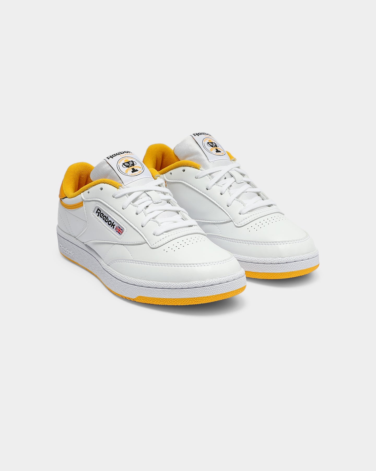 white and gold reebok