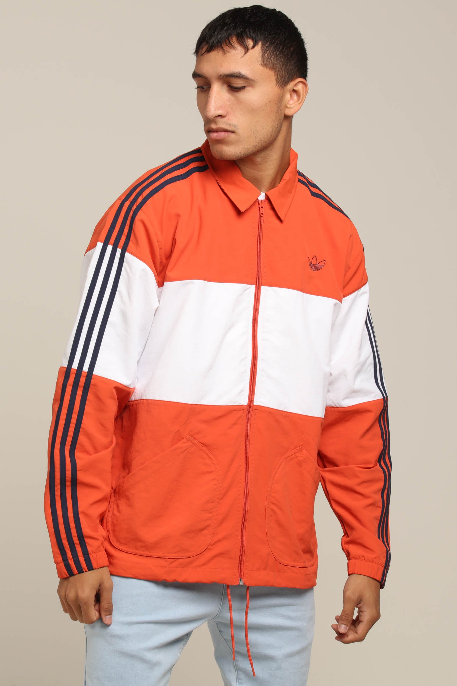 orange and white adidas jacket