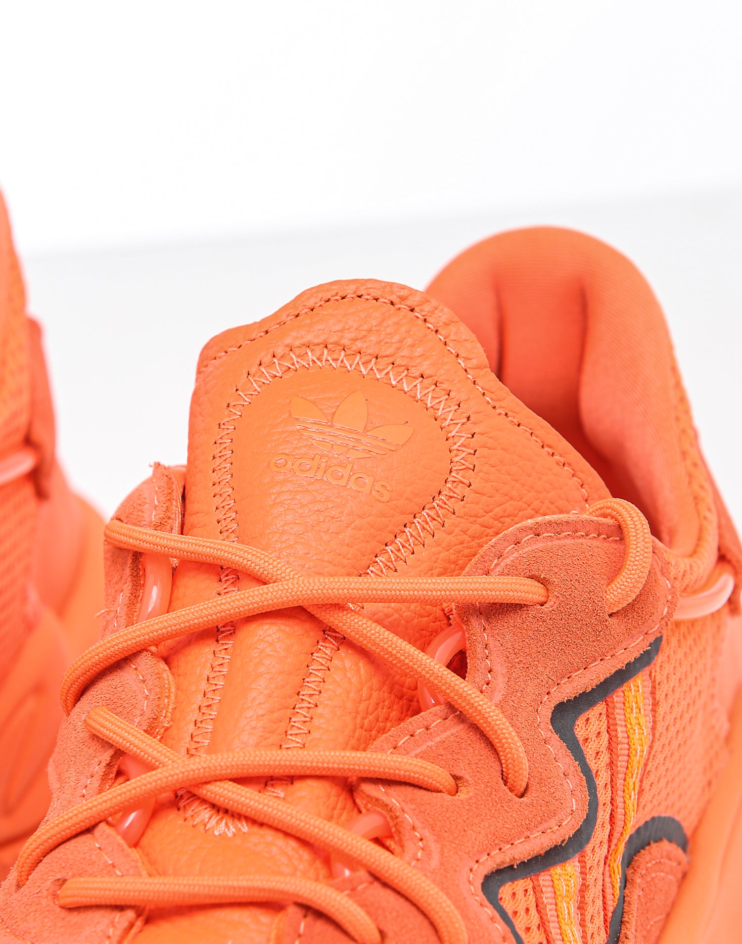 orange ozweego youth