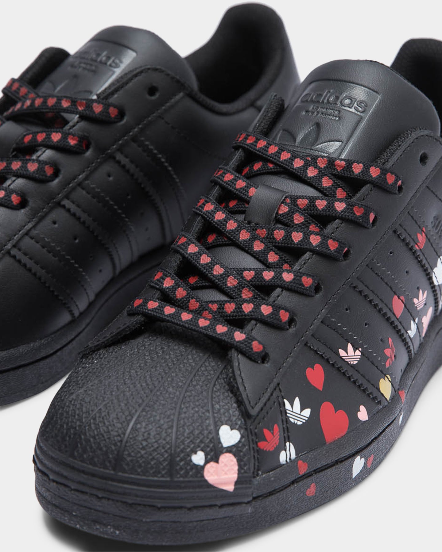 adidas superstar black and pink