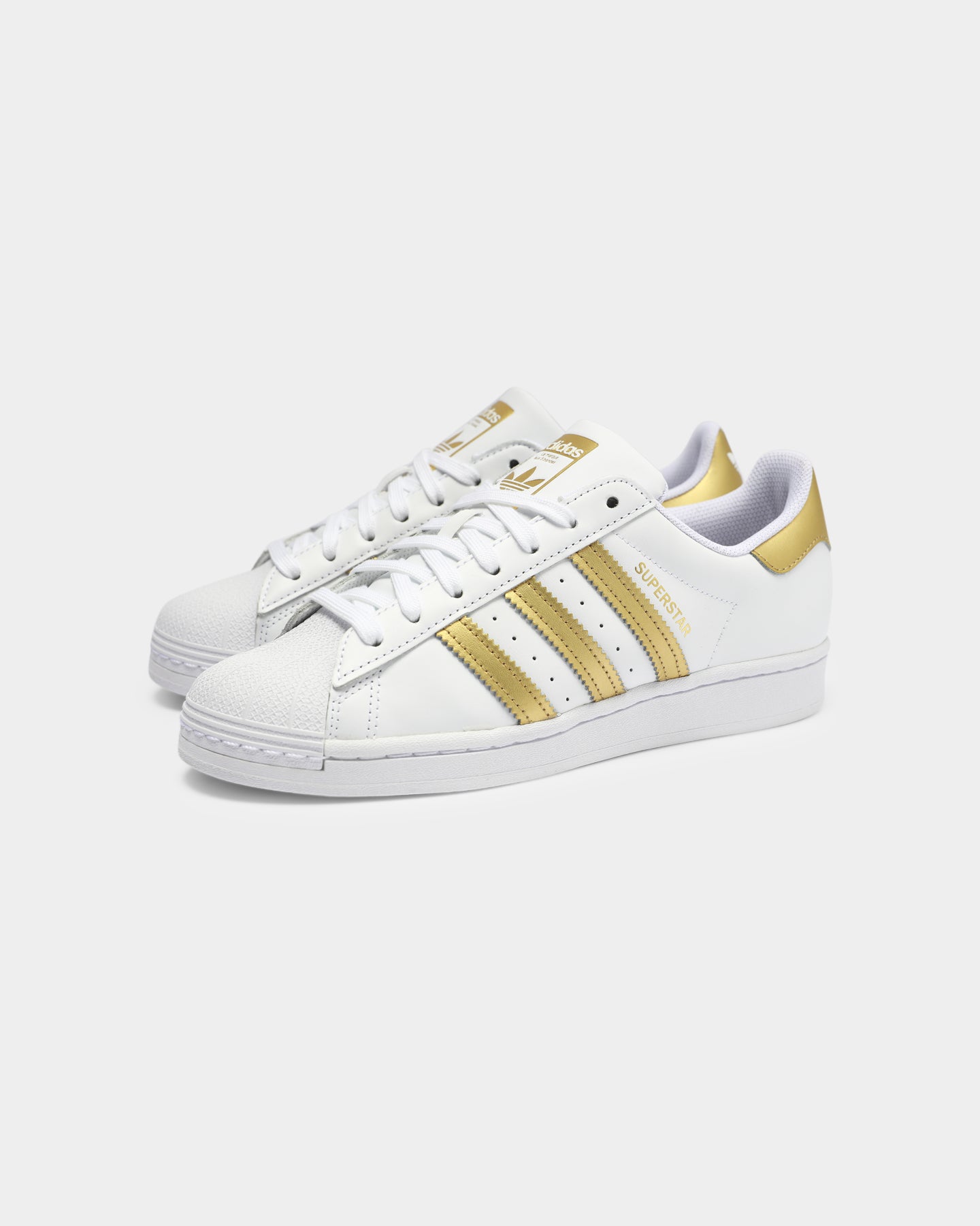 womens white and gold superstar