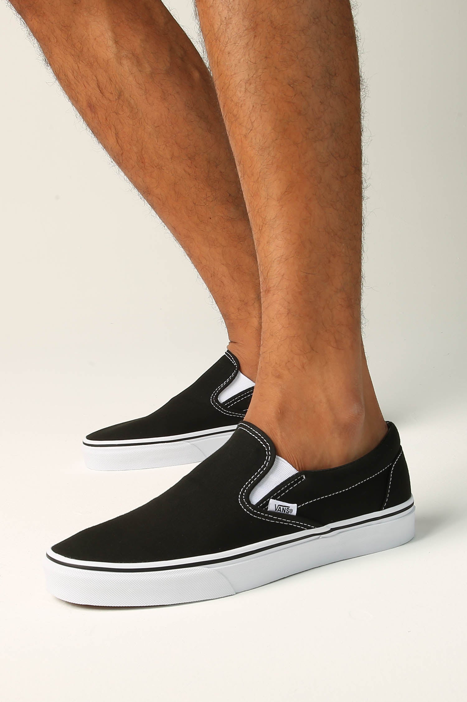 vans classic slip on black and white